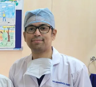 Dr. Debabrata Nandi in his paediatric cardiology consultation room, Kolkata